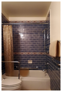 multiple H & H grab bars in tiled bathroom